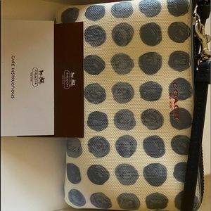 Polka dot Coach wristlet
